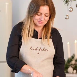 A mum wearing her personalised TSC apron