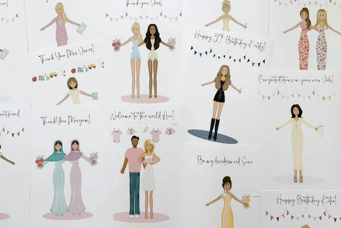 A spread of illustrated greeting cards with drawn couples, friends and families, among them a couple welcoming a new baby