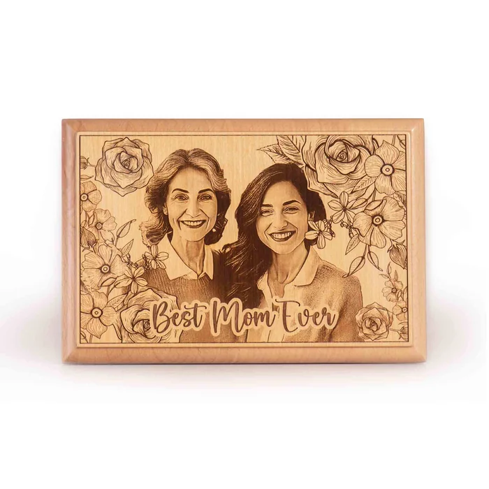 An engraved wooden plaque of a mother and daughter with the words Best Mom Ever